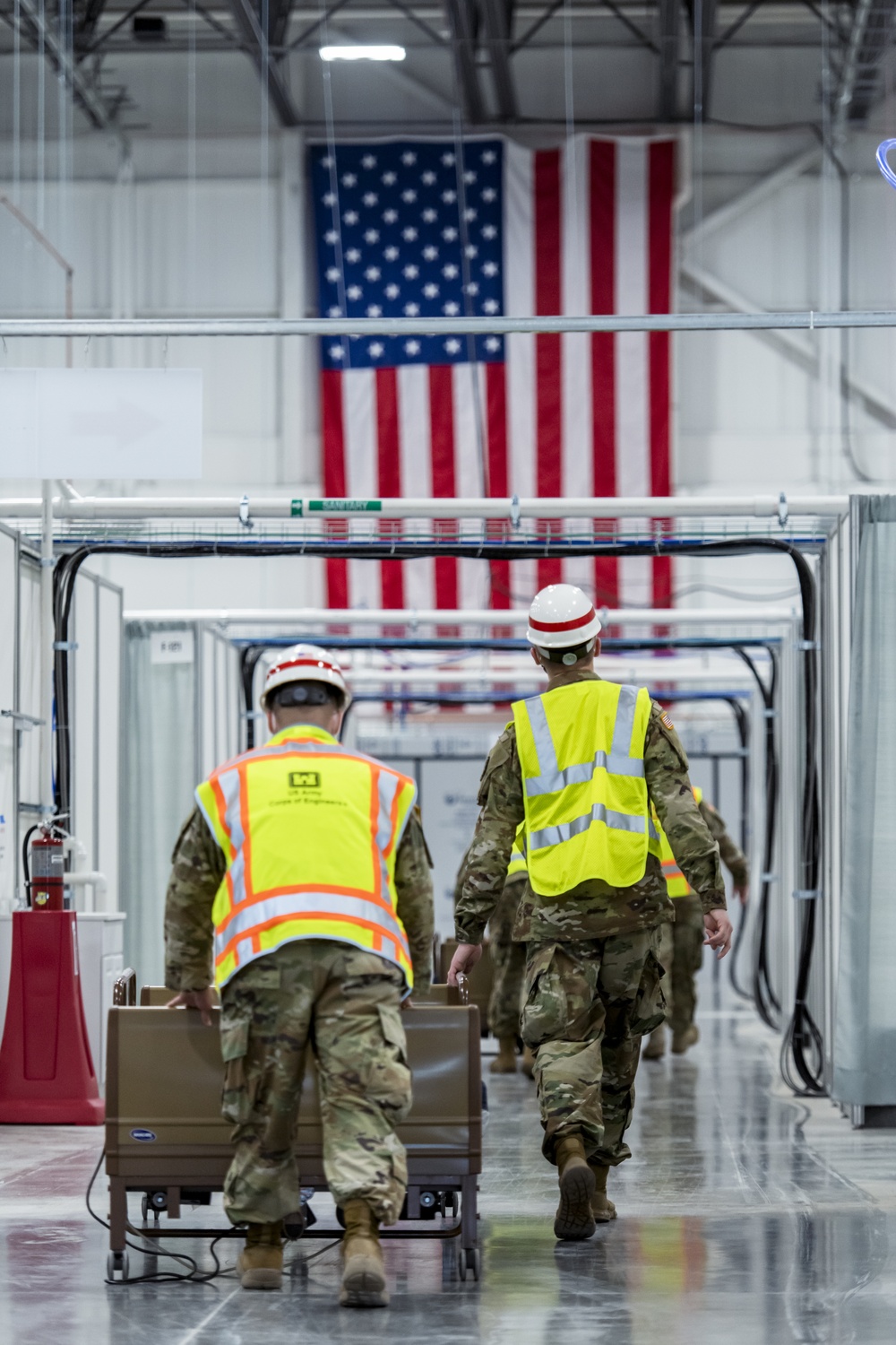 Michigan National Guard members place beds at COVID-19 alternate care facility