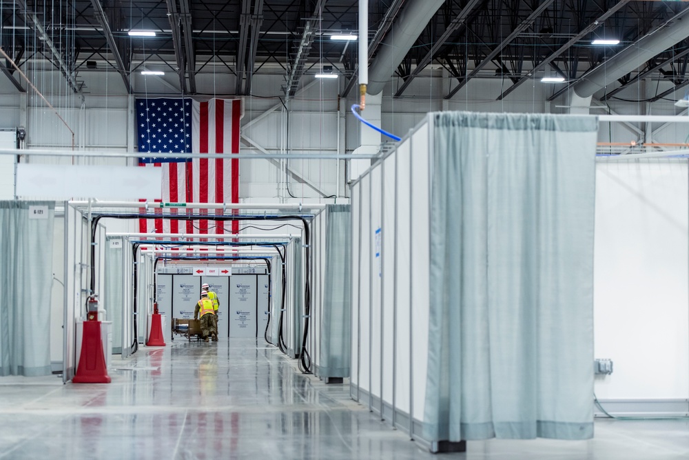 Michigan National Guard members place beds at COVID-19 alternate care facility