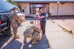 Senior Airman Quintana and Staff Sergeant Martinez deliver personal protective equipment to Grants, New Mexico.