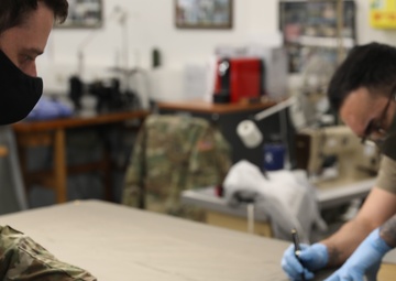 The 5th Quartermaster Theater Aerial Delivery Company and Supply Activity Europe produce masks in order to stop the spread of COVID-19