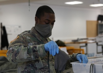 The 5th Quartermaster Theater Aerial Delivery Company and Supply Activity Europe produce masks in order to stop the spread of COVID-19