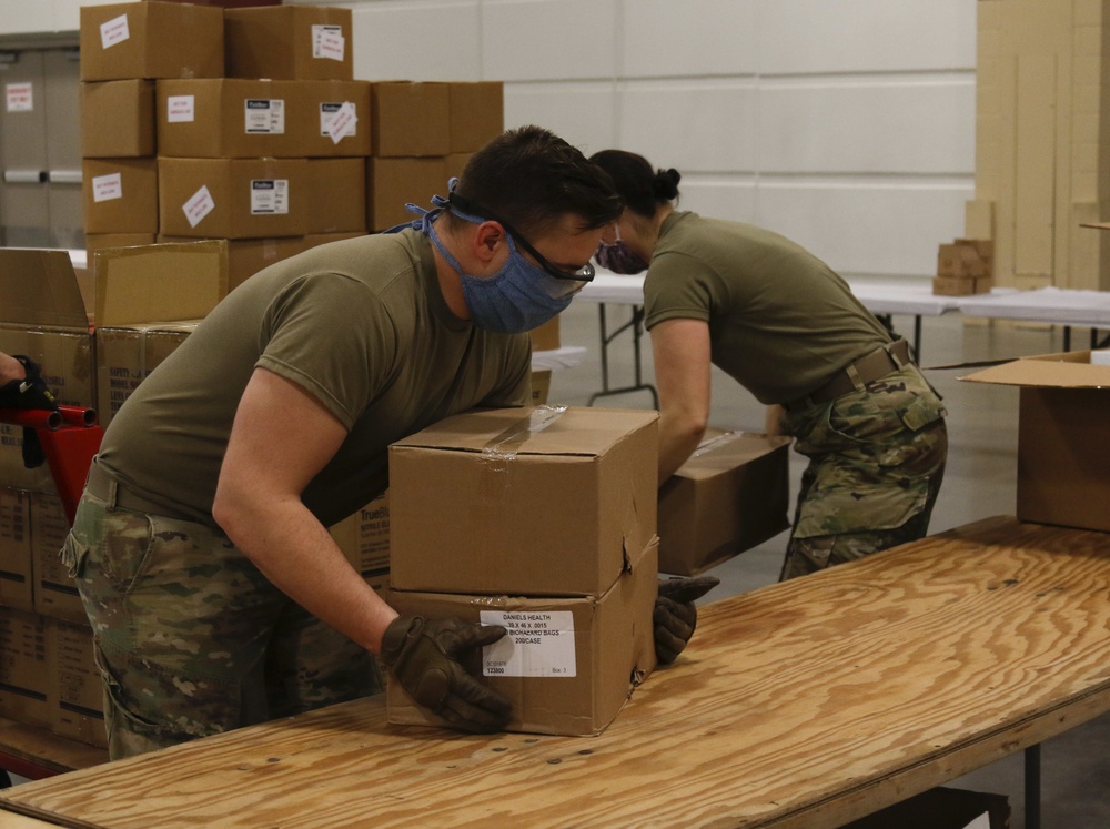 Wisconsin National Guard Soldiers help with shipment equipment at an Alternate Care Facility in Milwaukee, Wis.