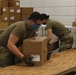 Wisconsin National Guard Soldiers help with shipment equipment at an Alternate Care Facility in Milwaukee, Wis.