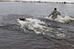 Cold-Weather Operations Course Class 20-05 students complete cold-water immersion training at Fort McCoy