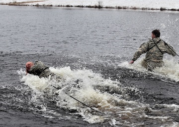 Photo Essay: Cold-Weather Operations Course Class 20-05 students complete cold-water immersion training at Fort McCoy