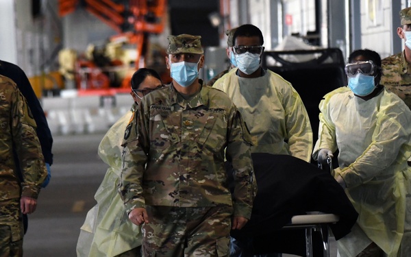 Military personnel honor deceased veteran in New York City