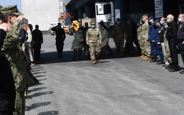 Military personnel honor deceased veteran in New York City