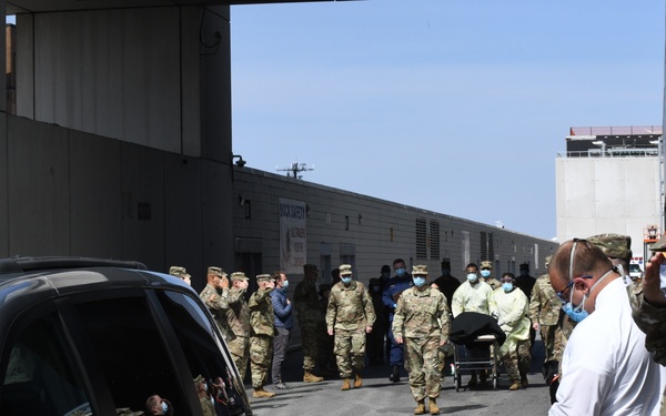 Military personnel honor deceased veteran in New York City