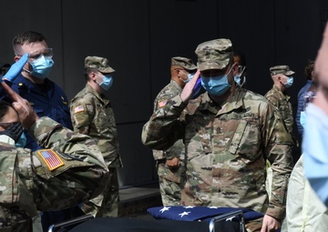 Military members honor veteran who died from COVID-19 at NYC field hospital
