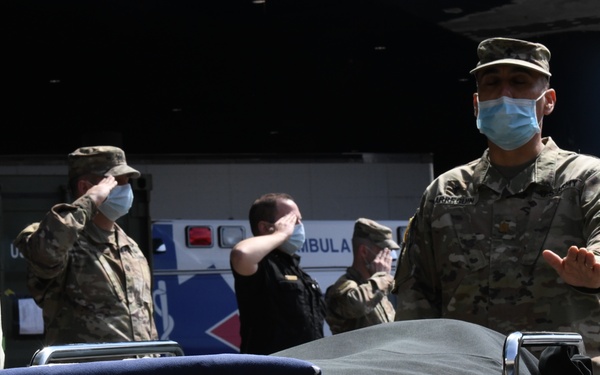 Military personnel honor deceased veteran in New York City