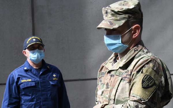 Military personnel honor deceased veteran in New York City