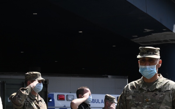 Military personnel honor deceased veteran in New York City