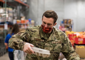 110th Wing packages food at the South Michigan Food Bank during COVID-19 response