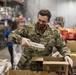 110th Wing packages food at the South Michigan Food Bank during COVID-19 response