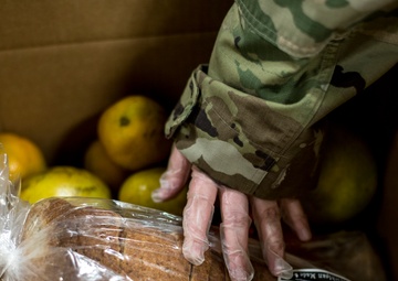 110th Wing packages food at the South Michigan Food Bank during COVID-19 response