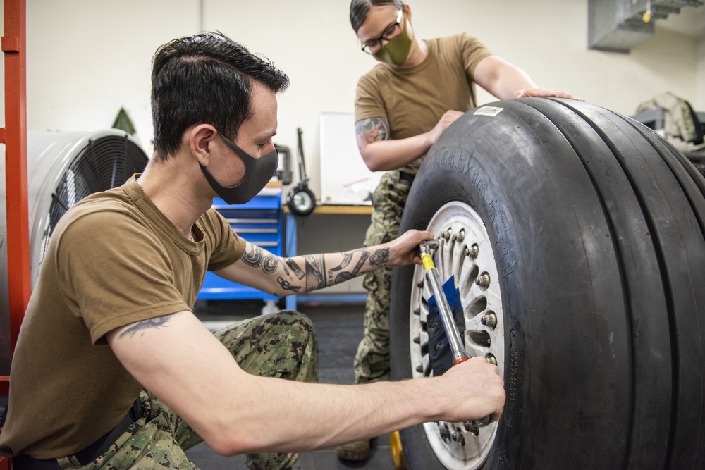 AIMD Detachment Kadena Conducts Maintenance On P-8A Poseidon Main Landing Gear Tire