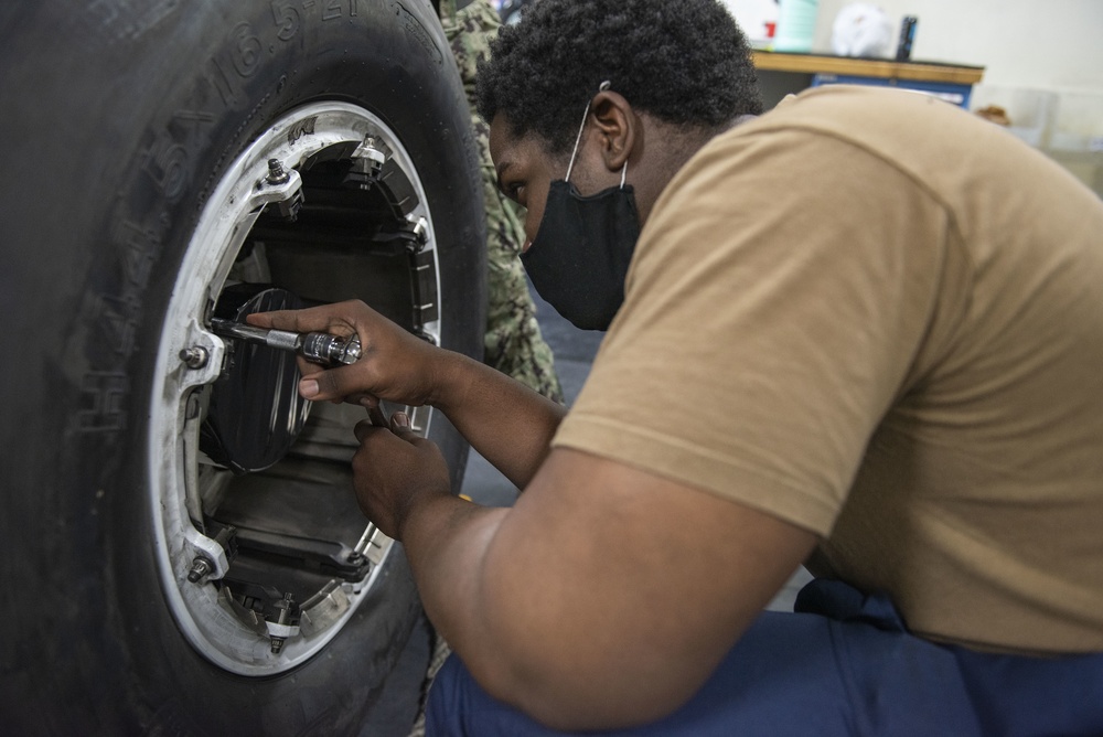 AIMD Detachment Kadena Conducts Maintenance On P-8A Poseidon Main Landing Gear Tire