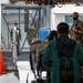 USNS Mercy Sailors Prepare Patient for Discharge