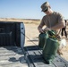 Soldiers fill sandbags and increase force protection measures