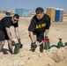 Soldiers fill sandbags and increase force protection measures