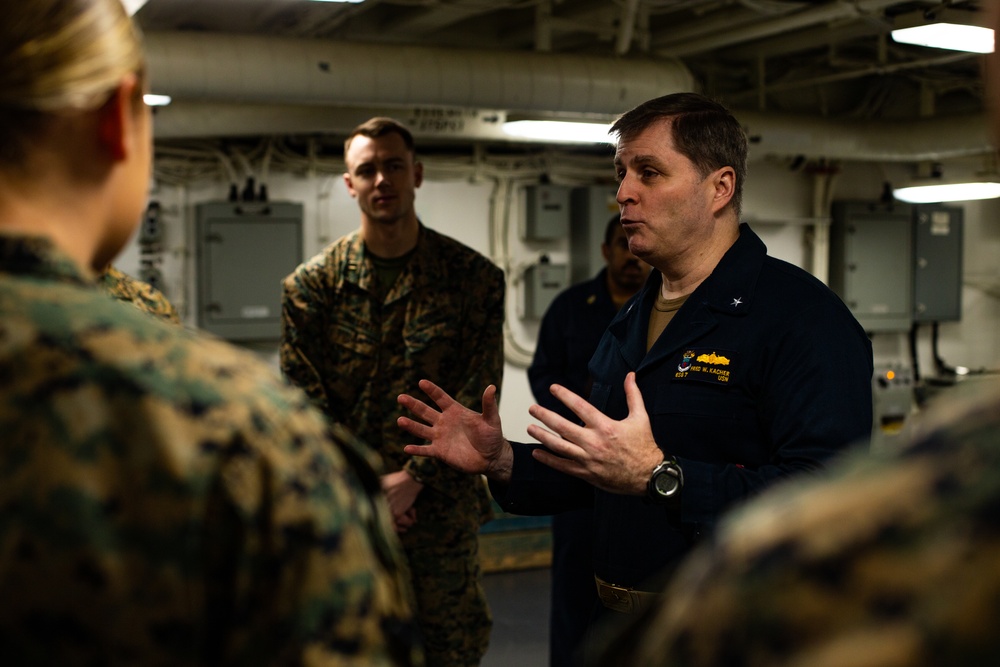 31st MEU Marine awarded by Rear Adm. Kacher aboard USS America