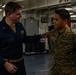 31st MEU Marine awarded by Rear Adm. Kacher aboard USS America