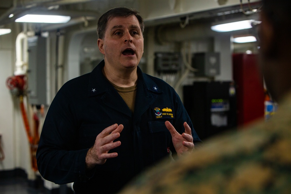 31st MEU Marine awarded by Rear Adm. Kacher aboard USS America