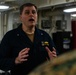 31st MEU Marine awarded by Rear Adm. Kacher aboard USS America