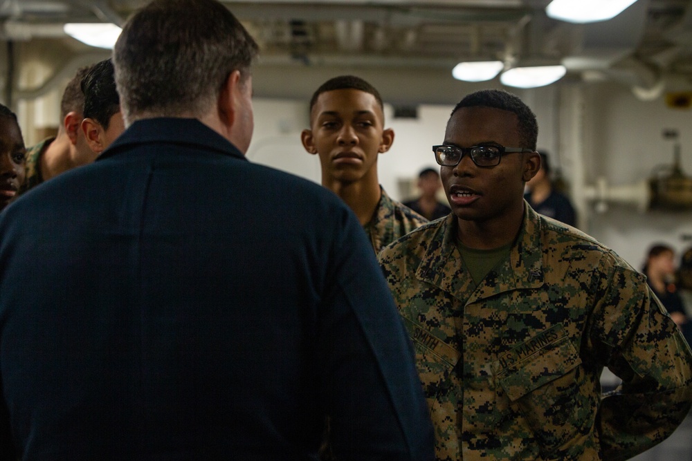 31st MEU Marine awarded by Rear Adm. Kacher aboard USS America