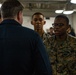 31st MEU Marine awarded by Rear Adm. Kacher aboard USS America