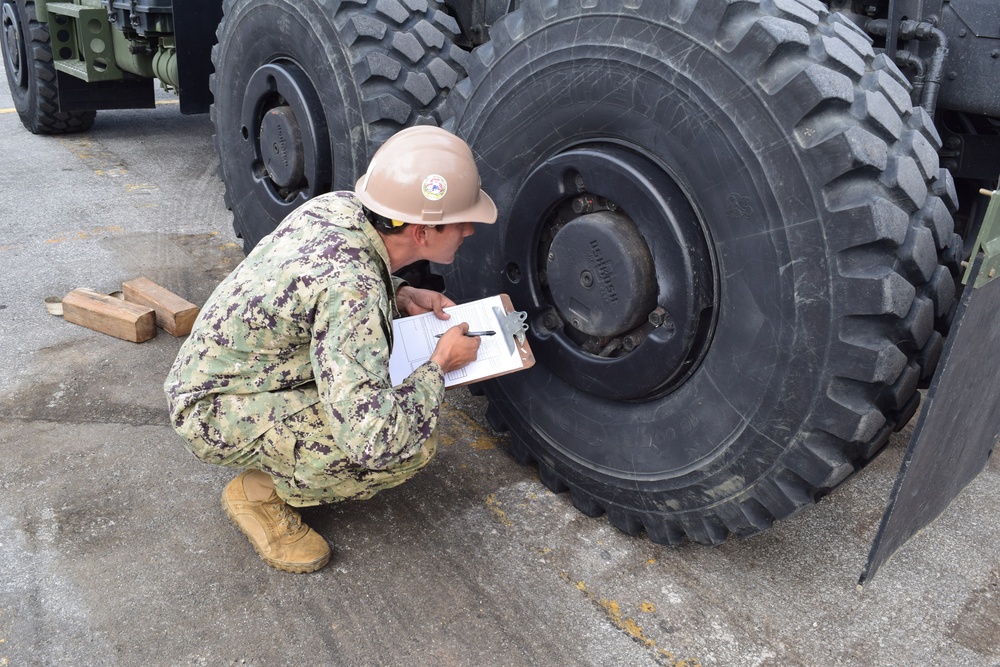 U.S. Navy Seabees with NMCB-5 conduct maintenance