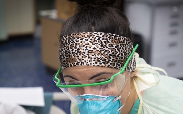 U.S. Navy Doctors, Nurses and Corpsmen Treat COVID Patients in the ICU Aboard USNS Comfort