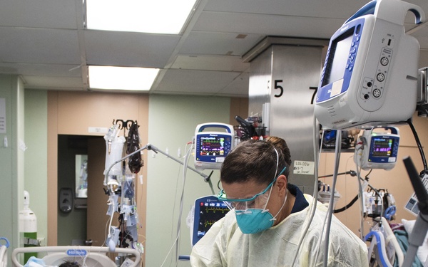 U.S. Navy Doctors, Nurses and Corpsmen Treat COVID Patients in the ICU Aboard USNS Comfort