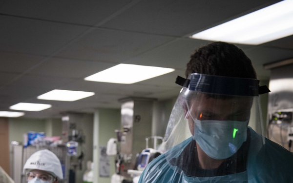U.S. Navy Doctors, Nurses and Corpsmen Treat COVID Patients in the ICU Aboard USNS Comfort