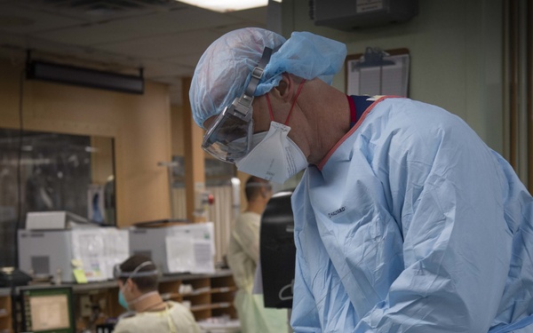 U.S. Navy Doctors, Nurses and Corpsmen Treat COVID Patients in the ICU Aboard USNS Comfort