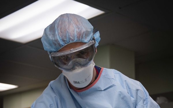 U.S. Navy Doctors, Nurses and Corpsmen Treat COVID Patients in the ICU Aboard USNS Comfort