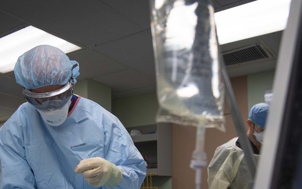 U.S. Navy Doctors, Nurses and Corpsmen Treat COVID Patients in the ICU Aboard USNS Comfort