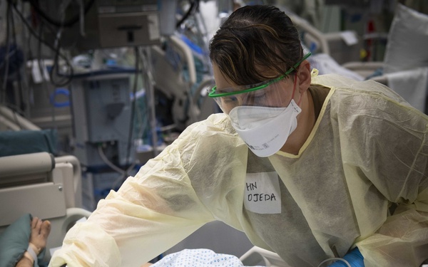 U.S. Navy Doctors, Nurses and Corpsmen Treat COVID Patients in the ICU Aboard USNS Comfort