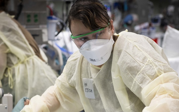 U.S. Navy Doctors, Nurses and Corpsmen Treat COVID Patients in the ICU Aboard USNS Comfort