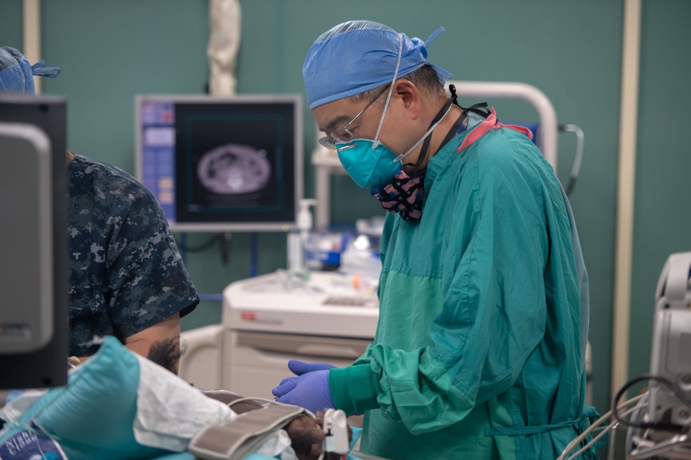 USNS Mercy Sailors Conduct an Interventional Radiology Study and Procedure on a Patient