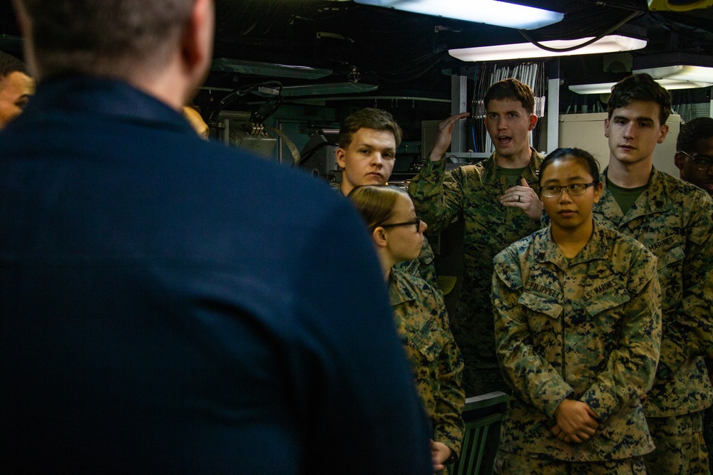 31st MEU Marine honored by Rear Adm. Kacher aboard USS America