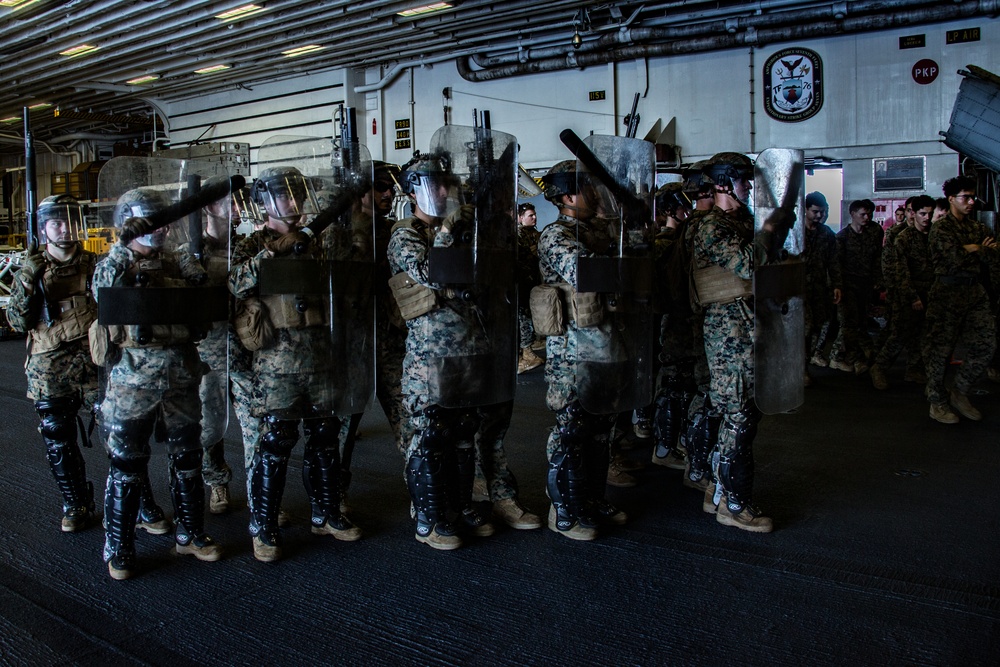 31st MEU Marines conduct riot control training aboard USS America in South China Sea