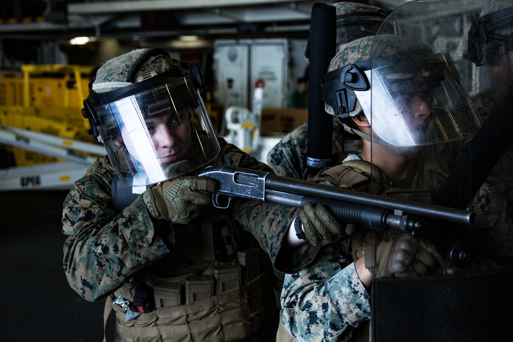 31st MEU Marines conduct riot control training aboard USS America in South China Sea