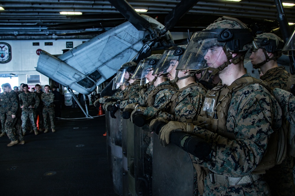 31st MEU Marines conduct riot control training aboard USS America in South China Sea