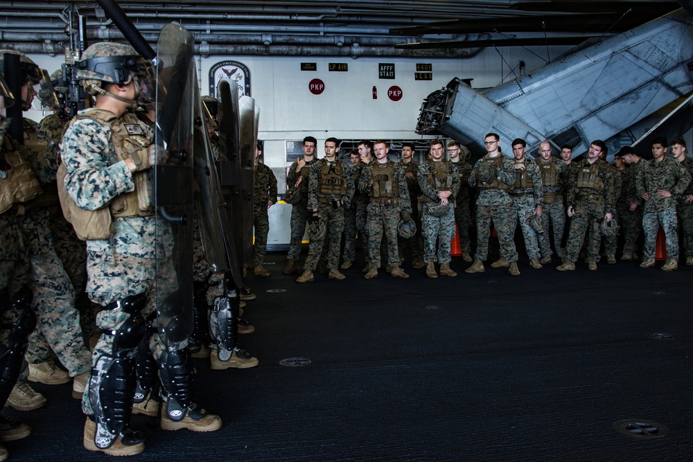 31st MEU Marines conduct riot control training aboard USS America in South China Sea