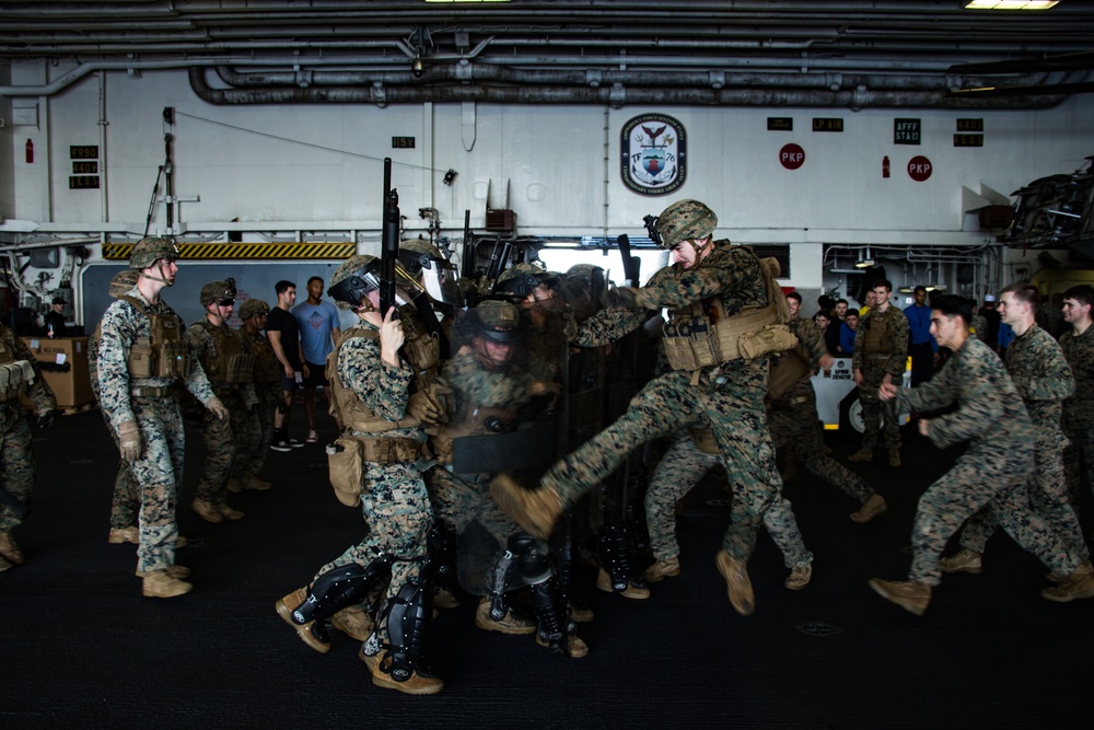 31st MEU Marines conduct riot control training aboard USS America in South China Sea