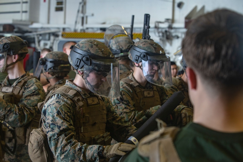 Let’s Start a Riot : Marines with the 31st MEU conduct riot control drills in South China Sea