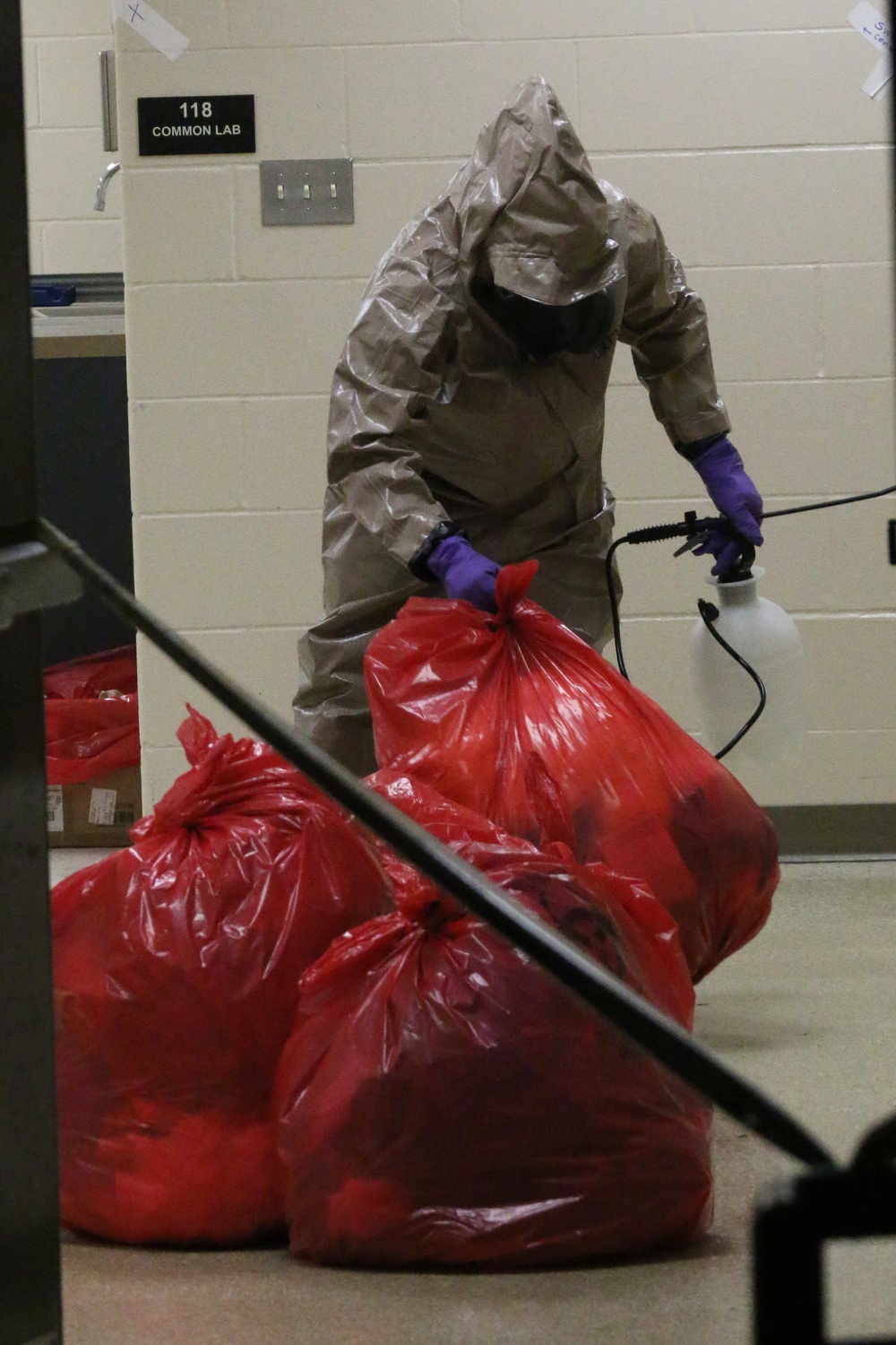 Iowa Soldiers and Airmen sanitize COVID-19 testing site