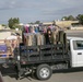 Marines, fire fighters &amp; families volunteer to move NMCRS Thrift Store