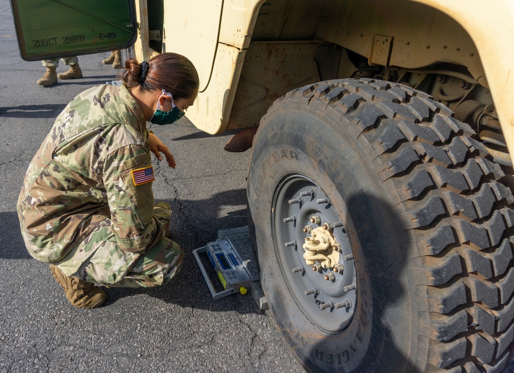 Soldiers and Airmen hold joint inspection for vehicle airlift op